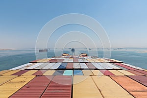 View on the containers loaded on deck of cargo ship.