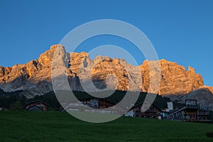 View of Conturines Mount at sunset from San Cassiano village in Badia Valley, South Tyrol, Bolzano province, Italy