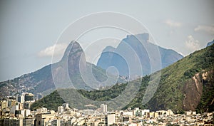 View of Copacabana district on the background of Vidigal distict, Dois Irmaos Mountain and Pedra da Gavea, Rio de Janeiro