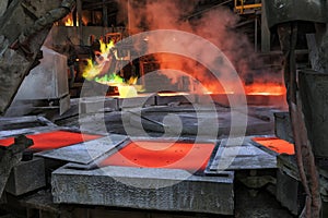 View of the copper casting to the molds in the smelting of the industrial plant.