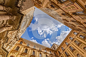 View from the courtyard of Basilica in the Benedictine Abbey of Montserrat Santa Maria de Montserrat in Catalonia, Spain