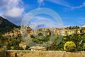 View of the cozy small town of Valdemossa from the observation deck on a summer day