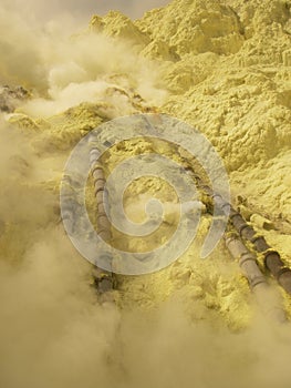 View on the crater of the Ijen volcano in Indonesia, a sulfur mine and toxic gaz