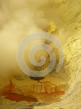 View on the crater of the Ijen volcano in Indonesia, a sulfur mine and toxic gaz