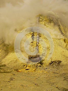 View on the crater of the Ijen volcano in Indonesia, a sulfur mine and toxic gaz