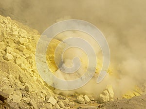 View on the crater of the Ijen volcano in Indonesia, a sulfur mine and toxic gaz