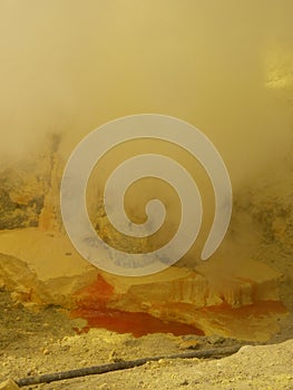 View on the crater of the Ijen volcano in Indonesia, a sulfur mine and toxic gaz