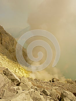 View on the crater of the Ijen volcano in Indonesia, a sulfur mine and toxic gaz