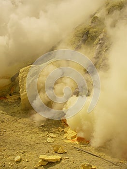 View on the crater of the Ijen volcano in Indonesia, a sulfur mine and toxic gaz