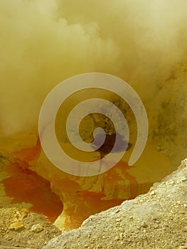 View on the crater of the Ijen volcano in Indonesia, a sulfur mine and toxic gaz