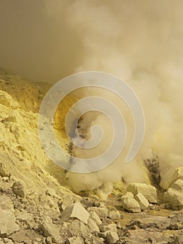 View on the crater of the Ijen volcano in Indonesia, a sulfur mine and toxic gaz