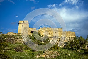 View of the crenellated walls on the rise of the medieval castle of Taibilla in Nerpio, photo