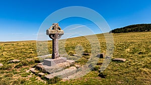 View of the cross of the Rode, in Aubrac near Nasbinals photo