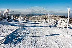 View of crosscountry skiing way and mount Serak