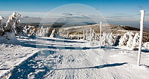 View of crosscountry skiing way and mount Serak