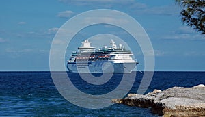 View of Cruise Ship Anchored off Island Shore