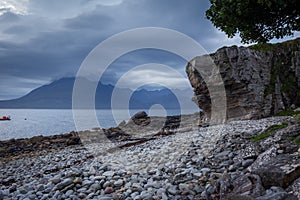 View on Cuillin Hills during late sunset/night from a small village Elgol, located in Isle of Skye