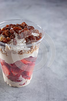 Mexican cup of fresas con crema, strawberries cream parfait, yogurt, bionicos photo