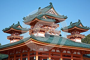 The blue-green curved roofs of Byakko-ro Tower at Heian-jingu Shrine. Kyoto. Japan photo
