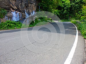 View of curvy Ghat road along the mountain range of Eastern Ghats leading to Yercaud, Tamil Nadu, India. Yercaud is famous hill