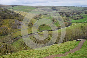 View of the dales from the top of Malham Cove Yorkshire Dales National Park, UK