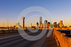 View of Dallas cityscape from the Houston St. Viaduct bridge during sunset