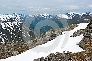 View from Dalsnibba mountain to Geiranger fjord and mountain peaks, Norway