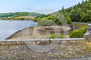 A view from the dam wall along the side of Ladybower reservoir, Derbyshire, UK