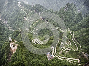 A view of the dangerous 99 curves at the Tongtian Road to Tianmen Mountain, The Heaven`s Gate at Zhangjiagie, Hunan Province, Ch