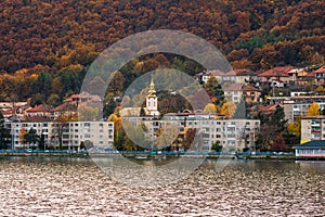 View of Danube river and Orsova city vegetation and buildings, waterfront view. Orsova, Romania, 2021