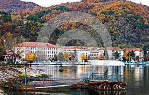 View of Danube river and Orsova city vegetation and buildings, waterfront view. Orsova, Romania, 2021