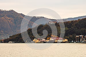 View of Danube river and Orsova city vegetation and buildings, waterfront view. Orsova, Romania, 2021