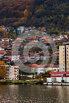 View of Danube river and Orsova city vegetation and buildings, waterfront view. Orsova, Romania, 2021