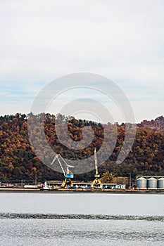 View of Danube river and Orsova city vegetation and buildings, waterfront view. Orsova, Romania, 2021