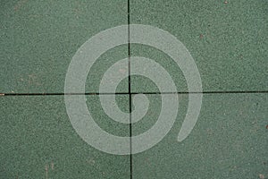 View of dark green EPDM rubber pavement from above
