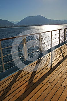 View from the deck of a cruise ship with Alanya, Turkey in the b