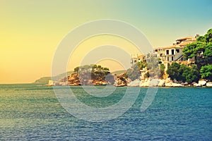 View from the deck of cruise ship on the Skiathos town. Skiathos island, Sporades archipelago. Greece. Toned image