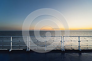 View from the deck of a cruise ship to the Baltic Sea in the early morning at sunrise