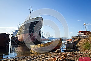 Decommissioned ships in a dismantling yard photo