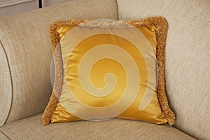 View of decorative pillow on sofa