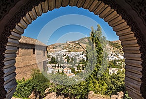 View from decorative window at the Albaicin district in Granada, Spain