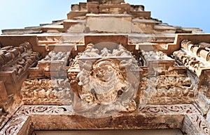 Fourhands deity in Khajuraho temple complex