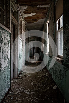 Derelict Hallway with Furniture - Abandoned Tuberculosis Sanatorium - New Jersey photo