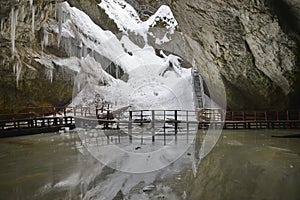 View with the descent sink-hole entrance the Scarisoara cave, Romania