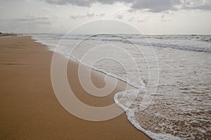 View of desert beach and sea