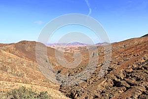 View of the desert hills from Mirador astronomico Sicasumbre, Fuerteventura, Spain