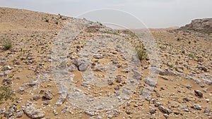 A view of a desert in the Middle East. Stone and Sand Desert Landscape. 4K video.