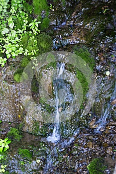 View of a detail of a small waterfall with little water