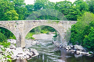 A view of Devils Bridge, a famous landmark on the river Lune near Kirkby Lonsdale, Cumbria, UK