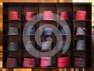 View of different colors ties in the showcase